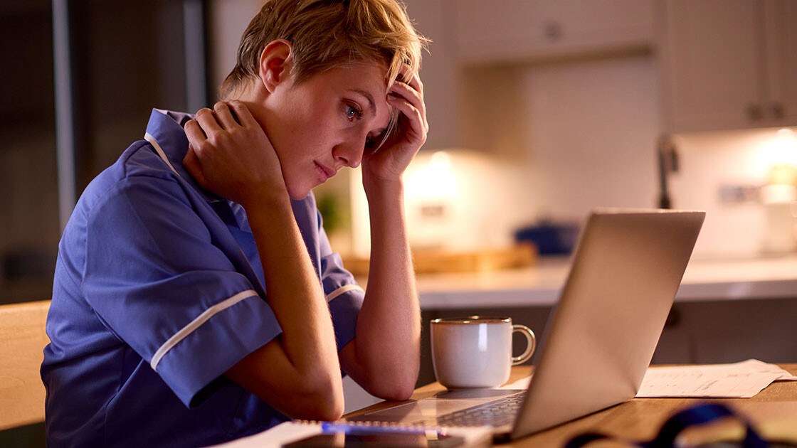 Long-term care nurse experiencing frustration with EMR documentation during late-night charting
