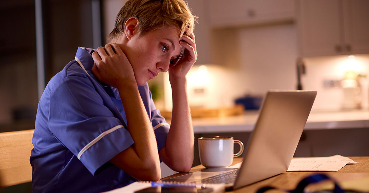 Long-term care nurse experiencing frustration with EMR documentation during late-night charting